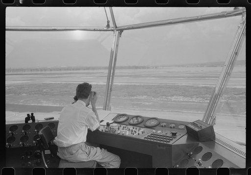 Untitled photo, possibly related to: Plane coming in at the municipal airport, seen from the control tower, Washington, D.C.