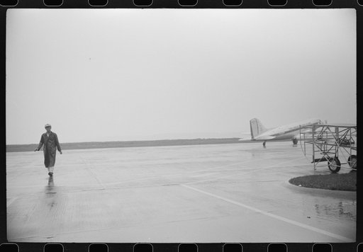 Untitled photo, possibly related to: A plane taxiing off to the main runway at the municipal airport, in Washington, D.C.