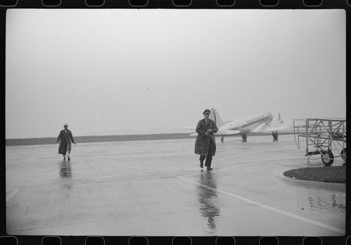 Untitled photo, possibly related to: A plane taxiing off to the main runway at the municipal airport, in Washington, D.C.
