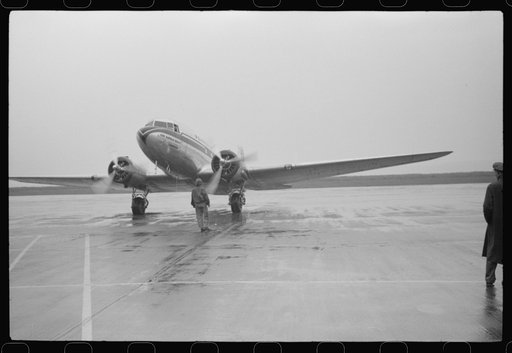 Untitled photo, possibly related to: A plane taxiing off to the main runway at the municipal airport, in Washington, D.C.