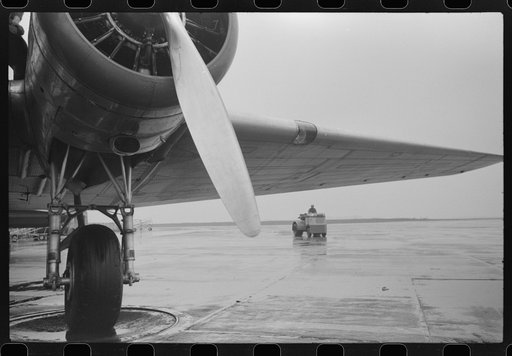 One of the many little trucks at the municipal airport in Washington, D.C. They are used to haul baggage and freight around the field