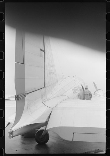 Untitled photo, possibly related to: A plane on the field at the municipal airport on a rainy day, Washington, D.C.