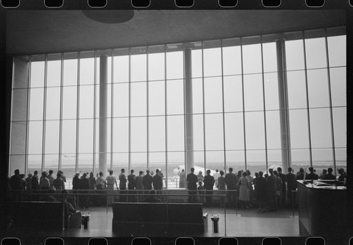 Untitled photo, possibly related to: Visitors watching planes. Seen from waiting platform at the municipal airport in Washington, D.C.