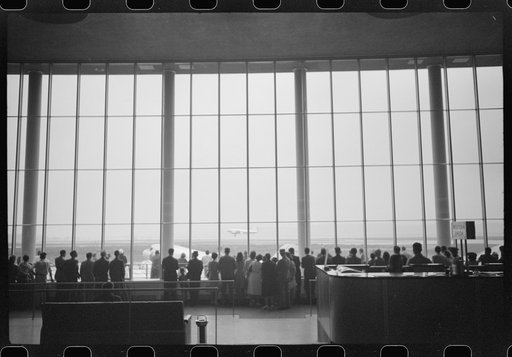 Untitled photo, possibly related to: Visitors watching planes. Seen from waiting platform at the municipal airport in Washington, D.C.
