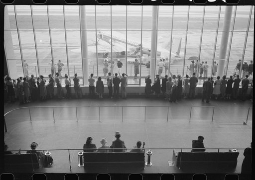 Untitled photo, possibly related to: Visitors watching planes. Seen from waiting platform at the municipal airport in Washington, D.C.