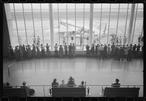 Untitled photo, possibly related to: Visitors watching planes. Seen from waiting platform at the municipal airport in Washington, D.C.