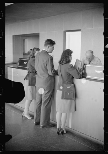 Untitled photo, possibly related to: Ticket counter in main waiting room of the municipal airport in Washington, D.C.