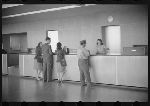 Untitled photo, possibly related to: Ticket counter in main waiting room of the municipal airport in Washington, D.C.