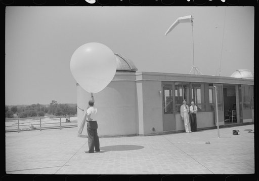Preparing to send up the weather balloon at the weather bureau at the municipal airport in Washington, D.C.