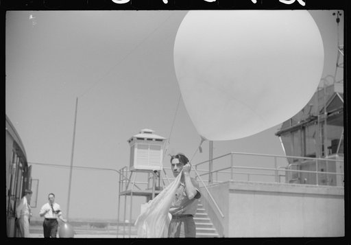 Preparing to send up the weather balloon at the weather bureau at the municipal airport in Washington, D.C.