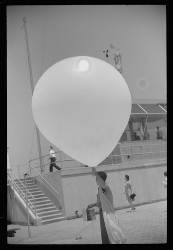Untitled photo, possibly related to: Preparing to send up the weather balloon at the weather bureau at the municipal airport in Washington, D.C.