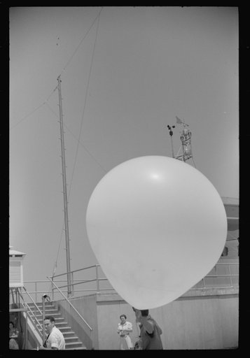 Untitled photo, possibly related to: Preparing to send up the weather balloon at the weather bureau at the municipal airport in Washington, D.C.