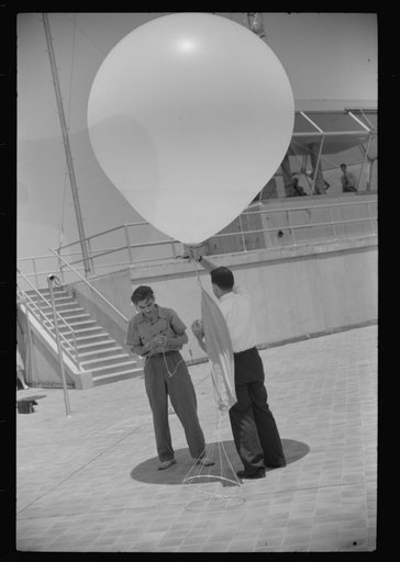 Untitled photo, possibly related to: Preparing to send up the weather balloon at the weather bureau at the municipal airport in Washington, D.C.