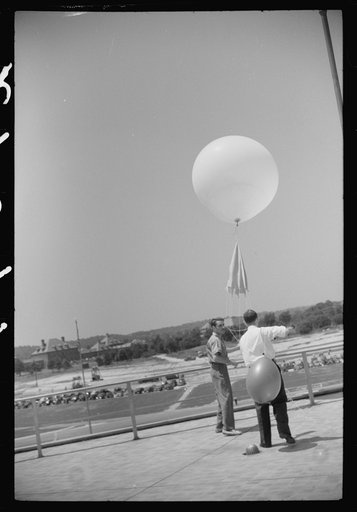 Untitled photo, possibly related to: Preparing to send up the weather balloon at the weather bureau at the municipal airport in Washington, D.C.