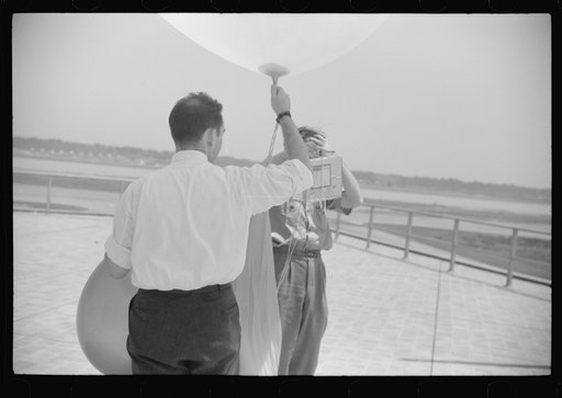 Untitled photo, possibly related to: Preparing to send up the weather balloon at the weather bureau at the municipal airport in Washington, D.C.