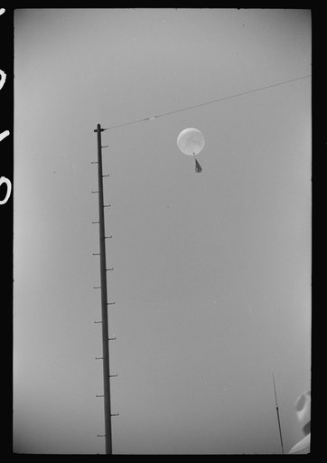 Untitled photo, possibly related to: Preparing to send up the weather balloon at the weather bureau at the municipal airport in Washington, D.C.