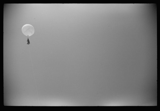 Untitled photo, possibly related to: Preparing to send up the weather balloon at the weather bureau at the municipal airport in Washington, D.C.