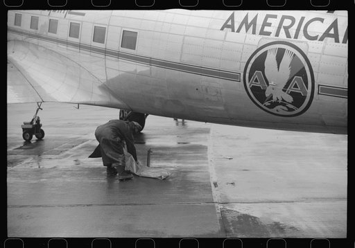 Untitled photo, possibly related to: Receiving weather report through the underground communication system at the field of the municipal airport in Washington, D.C.