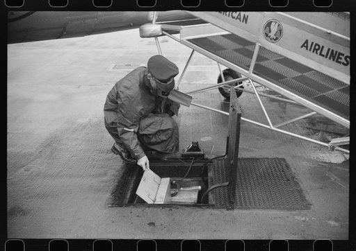 Untitled photo, possibly related to: Receiving weather report through the underground communication system at the field of the municipal airport in Washington, D.C.