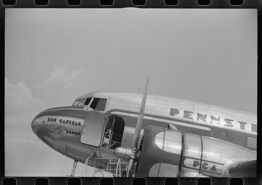 Untitled photo, possibly related to: Loading baggage on a plane at the municipal airport in Washington, D.C.