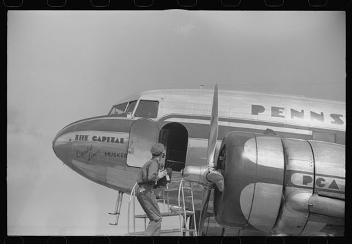 Loading baggage on a plane at the municipal airport in Washington, D.C.