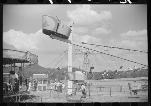 Untitled photo, possibly related to: Amusements at a small American Legion fair near Bellows Falls, Vermont