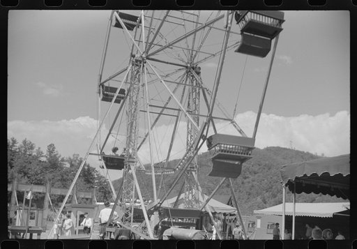 Untitled photo, possibly related to: Merry-go-round [i.e. ferris wheel] at a small American Legion carnival near Bellows Falls, Vermont