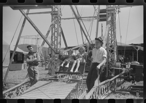 Untitled photo, possibly related to: Getting on the ferris wheel at an American Legion carnival near Bellows Falls, Vermont