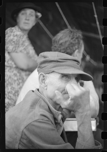 Untitled photo, possibly related to: Spectator at an auction in East Albany, Vermont