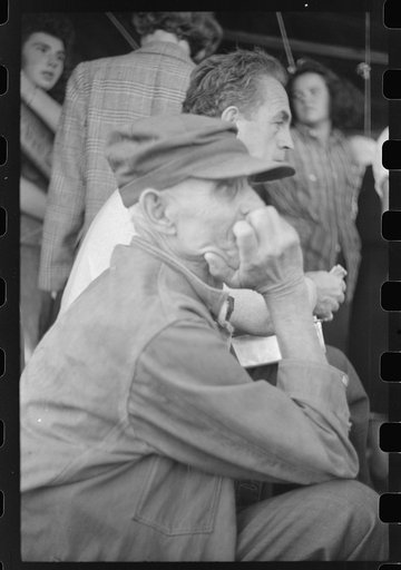 Untitled photo, possibly related to: Spectator at an auction in East Albany, Vermont