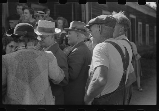 Untitled photo, possibly related to: Spectators at an auction in East Albany, Vermont.