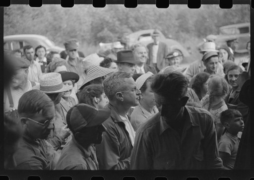 Untitled photo, possibly related to: Spectators at an auction in East Albany, Vermont
