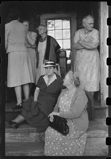 Untitled photo, possibly related to: Spectators at an auction in East Albany, Vermont