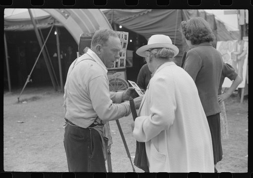 Untitled photo, possibly related to: Tintype photographer trying to make a sale at the Champlain Valley Exposition, Essex Junction, Vermont