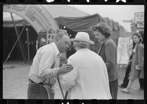 Untitled photo, possibly related to: Tintype photographer trying to make a sale at the Champlain Valley Exposition, Essex Junction, Vermont