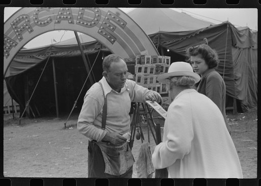 Untitled photo, possibly related to: Tintype photographer trying to make a sale at the Champlain Valley Exposition, Essex Junction, Vermont