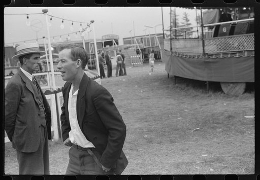 Untitled photo, possibly related to: Essex Junction, Vermont. Photographer at the Champlain Valley Exposition