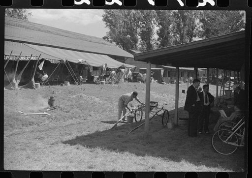 Untitled photo, possibly related to: Spectators at the sulky races at the Rutland Fair, Rutland, Vermont