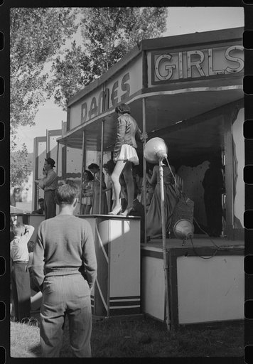 Untitled photo, possibly related to: At a "girlie" sideshow at the Rutland Fair, Rutland, Vermont