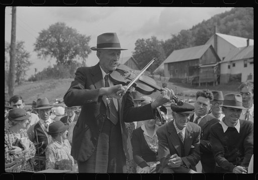 Untitled photo, possibly related to: Playing on old organ for the period dances at the "World's Fair" in Tunbridge, Vermont