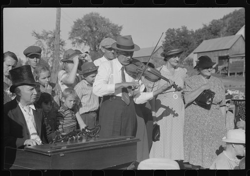 Untitled photo, possibly related to: Mr. Ed Larkin, seventy-eight year old fiddler at the "World's Fair" in Tunbridge, Vermont