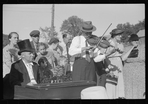 Untitled photo, possibly related to: Mr. Ed Larkin, seventy-eight year old fiddler at the "World's Fair" in Tunbridge, Vermont