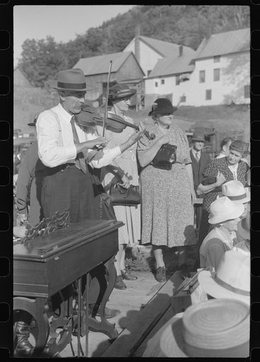 Untitled photo, possibly related to: Mr. Ed Larkin, seventy-eight year old fiddler at the "World's Fair" in Tunbridge, Vermont