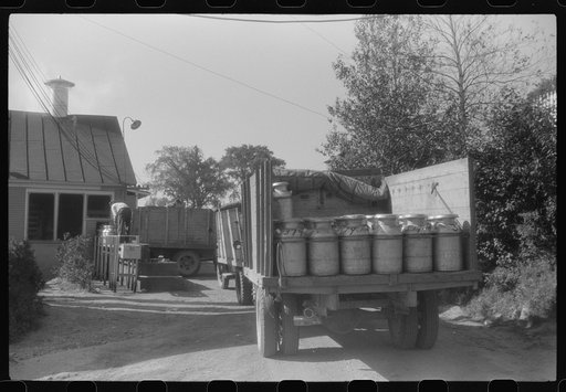 Untitled photo, possibly related to: Opening milk cans at the United Farmers Coop Creamery in East Berkshire, Vermont