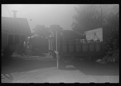 Untitled photo, possibly related to: Opening milk cans at the United Farmers Coop Creamery in East Berkshire, Vermont