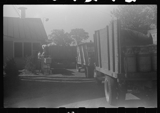 Untitled photo, possibly related to: Opening milk cans at the United Farmers Coop Creamery in East Berkshire, Vermont