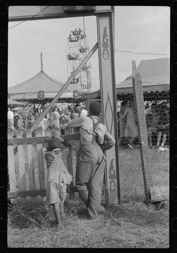 At the Greene County fair, Greensboro, Georgia. White schoolchildren were admitted free one day, Negro schoolchildren the next