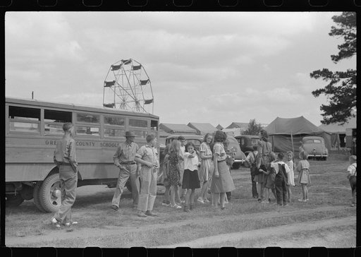 Untitled photo, possibly related to: Schoolchildren getting off the bus for free day at the fair. Greene County, Georgia