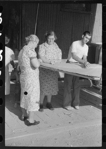 Untitled photo, possibly related to: Greensboro, Greene County, Georgia. Making a quilt from surplus commodity cotton