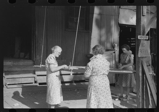 Untitled photo, possibly related to: Greensboro, Greene County, Georgia. Making a quilt from surplus commodity cotton